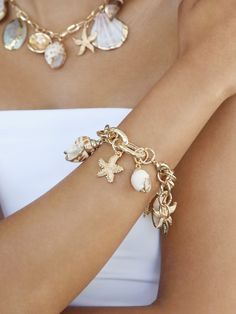 Materials 18k Gold Plated, Zinc, Steel, Shell Length 7" with a 1.5" chain extender Closure Clasp Beach Goddess, Summer Jewellery, Mermaid Tears, Mermaid Beach, Shell Bracelet, Chain Extenders, Gold Plated Bracelets, Fashion Business, Jewelry Inspo