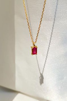 Make a statement with our Ruby Birthstone Necklace, the perfect accessory for any outfit. The ruby gemstone adds a pop of color and sophistication to any look, while the delicate 14k gold-filled chain gives it a touch of elegance. Gift it to your loved ones born in July or to anyone who appreciates a stunning piece of jewelry! 💎 #gemstonejewelry #giftsforher #rubynecklace #goldjewelry #birthdaygift #spring2023 #summerfashion #birthstonejewelry Red Minimalist Jewelry With Birthstone, Minimalist Red Birthstone Jewelry, Elegant Red Everyday Necklace, Elegant Everyday Red Necklace, Dainty Red 14k Gold Necklace, Elegant Red Necklace For Everyday, Red Tarnish-resistant Pendant Jewelry, Minimalist Ruby Birthstone Necklace, Minimalist Ruby Jewelry As Gift