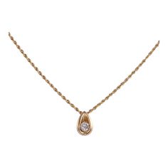 This is part of Chairish’s Fine Jewelry assortment.  Estate diamond teardrop pendant on chain. This 14 karat yellow gold teardrop pendant features a .30 carat diamond. The diamond has I2 clarity and H color. The teardrop diamond pendant comes on a 16″ 14 karat yellow gold chain. [TRES 119 P]  Dimensions .45″H x .25″W x .20″D (pendant) on a 16″ chain  Metal: 14k Gold,Yellow Gold Stone: Diamond Stone Cut: Round Cut Classic 14k Gold Teardrop Pendant Diamond Necklace, Classic 14k Gold Teardrop Diamond Necklace, Gold Solitaire Teardrop Pendant Necklace For Formal Occasions, Gold Teardrop Pendant Solitaire Necklace For Formal Occasions, Gold Solitaire Necklace With Teardrop Pendant For Formal Occasions, Formal Teardrop 14k Gold Diamond Necklace, Formal 14k Gold Teardrop Diamond Necklace, Formal Yellow Gold Teardrop Diamond Necklace, 14k Gold Teardrop Diamond Necklace