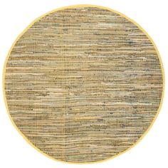 a round rug with yellow trimmings on the top and bottom, in an oval pattern