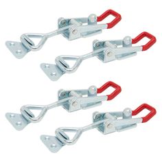 three red and silver metal hooks on a white background