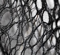 black and white photograph of an abstract net