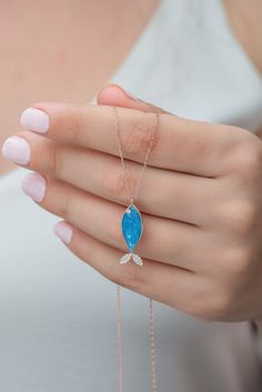 Blue Enameled Stone Fish Silver Necklace ♥ ✔️Metal Used: 925 Sterling Silver ✔️Weight : 2,00 Gr ✔️Figure Width: 0,80 Cm ✔️Figure Height: 2,50 Cm ✔️Chain Length : 42 Cm ✔️Stone Type : Zircon & Enameled ✔️Coating : Rose Gold ⚠️Care: It does not darken as long as contact with substances such as Perfume, Water, Alcohol, Cream, Bleach is avoided. -TRDYL781 Sterling Silver Fish-shaped Jewelry Gift, Sterling Silver Fish-shaped Jewelry As Gift, Sterling Silver Fish-shaped Jewelry, Fish Jewelry Silver, Sterling Silver Necklace Dainty, Dainty Silver Necklace, Stone Fish, Fish Jewelry, Fish Necklace