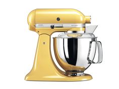 an image of a yellow mixer on a white background with the words kitchen aid written below it