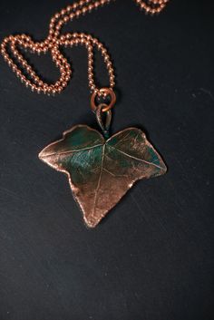 Copper jewelry pendant ivy leaf with a turquoise patina for a | Etsy Handmade Bronze Leaf Jewelry, Copper Leaf-shaped Jewelry Gift, Copper Leaf Jewelry Gift, Copper Flower Pendant Necklace As Gift, Bronze Patina Pendant Necklace, Nature-inspired Leaf Shaped Copper Jewelry, Nature-inspired Rose Gold Copper Jewelry, Handmade Copper Pendant Necklace, Bronze Copper Necklace With Patina