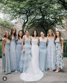 a group of women standing next to each other