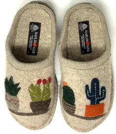 From HAFLINGER&#x2C; the Cactus Appliqued Wool Mule Slippers feature:Soft&#x2C; boiled-wool upper massages the foot for all-day comfortArtisan cactus appliquesSlip-on constructionWool liningLatex coated felt wool outsole is both comfortable and flexibleGrip dots on the sole help you keep your footingFlat heelImported. Felted Slippers Pattern, Cold Weather Shoes, Fun Slippers, Soft Sole Slippers, Streetwear Chic, Felt Wool, Felted Slippers, Boiled Wool, Streetwear Men Outfits