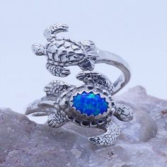 Sea Turtles adjustable spoon ring for LadiesMaterial: Sterling Silver 925Size Adjustable size 7 to 9Stamped "925"Gemstone: 5X7mm blue opal (or see selection for other choices)Beautiful creatures from the Oceans!ring for womenComes with jewelry boxready to ship Adjustable Opal Rings For Gifts, Adjustable Opal Rings Gift, Adjustable Nickel-free Opal Promise Ring, Nickel Free Adjustable Opal Promise Ring, Adjustable Opal Ring Jewelry, Adjustable Opal Ring For Gift, Adjustable Open Opal Ring For Gift, Adjustable Open Opal Ring Gift, Adjustable Open Opal Ring As Gift