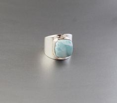 Larimar Ring , Blue Stone, Bridal Ring , Wedding Ring, Organic Ring, Sterling Silver Ring, Statement Ring, Gemstone Ring, Square Silver Ring............................................................................This is a highly spiritual stone that works effectively within all of the chakras from the heart chakra through to the crown chakra, including the higher heart, which aids compassion.It helps to release stored negative emotions such as angry thoughts, remembered pain and other detrim Adjustable Blue Larimar Ring, Larimar Gemstone Jewelry For Wedding, Wedding Larimar Gemstone Rings, Angry Thoughts, Engagement Ring Boho, Boho Statement Ring, Ring Blue Stone, Blue Gemstone Ring, Blue Gemstone Rings