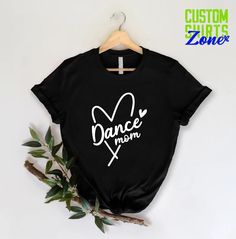 "Dance Mom Shirt,Dance Mom Gifts,Dance Shirts for Mama,Sports Mom Life Shirt,Mother's Day Gift,Dance Fan Shirt,Ballet Mom Tee,Cool Mom Gift Funny Good Moms Say Bad Words Shirt,Mother's Day Gift,Gift for Mama,Mothers Day Shirt,Mom Life Be Like, Mom gift,Cute Mom Shirt, Mama Tee, Retro Vintage Mama Shirt, Leopard Mama Shirt, Motherhood Shirt, Cute Mom Shirt,Mothers Day Gift, Mama T-shirt,Mom Life Shirt,Mama Shirt 🎁 Enjoy your shopping ! Need custom made shirts? Don't hesitate to message us! Thanks for your support! CustomShirtsZone_ Family ----- How To Order ----- 1-) Please, check and review all the photos. 2-) Choose your t-shirt size and color. *Different styles of shirts may have different shades of same color choice due to different manufacturer brands. *For this reason, we recommend y Black Summer Top For Dance Class, Black Letter Print Dance Top, Black Short Sleeve Top For Dance Class, Black Tops With Letter Print For Dance Class, Black Graphic Print Tops For Dance, Black Short Sleeve Tops For Dance, Black Relaxed Fit Top For Dance Class, Black Dancewear Tops For Dance, Stretch Dancewear Tops For Dance Class