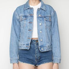 80s cropped denim jacket in the perfect natural vintage fade. in-seam pockets and buttoned flat pockets. adjustable button tabs at waist. Size: labeled M - fits S-M Label: susquehana blues Bust: 42" Waist: 35" Shoulder width: 18" Length: 20" Sleeve length (from center back neck): 31" Content: 100% cotton Vintage Denim Jacket With Buttoned Pockets In Relaxed Fit, Vintage Denim Jacket With Buttoned Pockets And Relaxed Fit, Summer Cropped Medium Wash Outerwear, Summer Cropped Outerwear In Medium Wash, Spring Washed Blue Denim Jacket With Buttoned Pockets, Light Wash Button-up Denim Jacket, Denim Cropped Jacket With Pockets, Spring Light Wash Denim Jacket With Buttoned Pockets, Cropped Medium Wash Denim Vest With Pockets