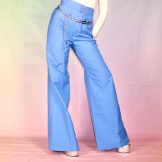 Vintage 70s bell bottoms 🦋 Vintage 1970s 🦋 Blue high waisted bell bottom flare disco retro trousers deadstock NWT Label: Sears, JR Bazaar  Made in USA  65% polyester  35% cotton Size 11/ 28 waist/ 32.5 inseam, see measurements  Super nice and chic disco flared wide leg pants ▫️original tags still attached, deadstock  ▫️Awesome metal adjustable straps on each side of waist  ▫️Two button closure, zipper fly  ▫️Two front pockets, no back pockets  ▫️Very nice lightweight material, no stretch 🌈 MEASUREMENTS 🌈 Waist: 27" (sits very high)  Rise: 13.5" Hips: 40" Inseam: 33" Thigh at top: 12" flat Model is 5'4" wears size small, these fit loose, pinned in photos slightly  Free USA shipping  #70s #vintage #deadstock #retro #bellbottoms 70s Inspired Flare Bottoms For Spring, Chic Blue Full-length Flares, Trendy Blue Wide Leg Flares, Retro Wide Leg Flares For Spring, Chic Blue Wide-leg Flares, 70s Inspired Fitted High Waist Bottoms, Chic Blue Flare Wide Leg Pants, High Waist Flare Jeans For Party In Spring, High Waist Blue Flare Jeans With Belt Loops