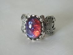 Dragons Breath Fire Opal Triple Moon Ring wiccan jewelry pagan | Etsy Magical Silver Moon Phase Jewelry, Magical Silver Jewelry With Sun And Moon Design, Magical Silver Moon Jewelry, Mystical Silver Jewelry With Sun And Moon Design, Mystical Sun And Moon Design Ring, Magical Sun And Moon Design Ring, Gothic Silver Oval Jewelry, Mystical Silver Moon Phase Ring, Silver Gothic Oval Jewelry