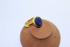 Beautiful Lapis stone handmade gold brass plated ring. stone color - blue stone name - Lapis metal plating - gold brass material - brass HAPPY SHOPPING WITH US THANK YOU. Gold Rings With Gemstone In Brass, Blue Gold Plated Rings As Gift, Blue Gold Plated Rings For Gift, Gold Plated Blue Rings As Gift, Blue Gold-plated Rings For Gifts, Gold Rings With Natural Stones For Gift, Yellow Gold Rings With Natural Stones For Gift, Brass Jewelry With Bezel Setting For Gift, Spiritual Gold Rings With Bezel Setting