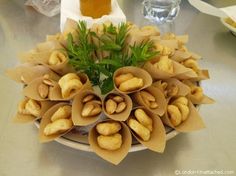 there is a plate full of nuts on the table