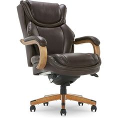 a brown leather office chair with wooden arms and footrests on an isolated white background