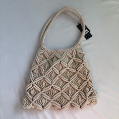 Macrame Woven Style Natural Bag Spring Macrame Bags For Daily Use, Spring Macrame Bag For Daily Use, Spring Macrame Shoulder Bag For Daily Use, Bohemian Macrame Shoulder Bag, Spring Macrame Tote Shoulder Bag, Bohemian Macrame Shopping Bag, Everyday Bohemian Macrame Shoulder Bag, Beige Macrame Shoulder Bag For Everyday Use, Everyday Beige Macrame Shoulder Bag