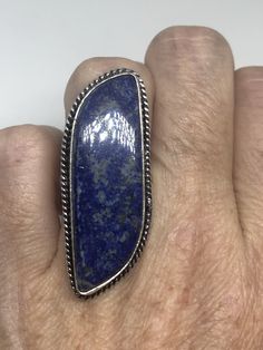 Large genuine blue Lapis Lazuli Vintage ring Low content silver not sterling. Size 7 Can be re sized. My jeweler charges $10-$20 All rings are shipped free in the US in a nice gift box. Check out our over a THOUSAND great reviews Engraving is $4 per letter and is not always perfect depending on the piece. It can take a few days if the jeweler is busy. This is payable to Paypal Judithsltd@gmail.com Collectible Blue Sterling Silver Jewelry, Unique Blue Nickel-free Rings, Mermaid Ring, Sterling Silver Wedding Band, Lapis Lazuli Ring, Blue Lapis Lazuli, Blue Lapis, Vintage Ring, Gold Details