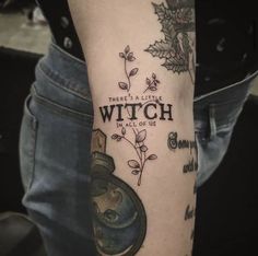 a person with a tattoo on their arm that reads, there is a little witch wall of us