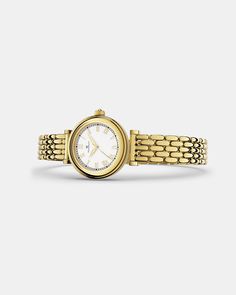 Case diameter: 24 mmCase thickness: 6,8 MMMaterial: 22k gold-plated 316L stainless steelDial: White dial in brassIndex & hands: Polished goldGlass: Flat sapphire coated mineral glassMovement: Seiko VJ21 Second hand: Yes, tickingWater Resistance: 3 ATM Strap: Solid strap in 22k gold-plated 304L stainless steelSize: All our straps are adjustable and fit wrists of all sizesLug width: 10 mmPackaging: Black presentation box with a white, leather interiorUnisex: YesWarranty: 2-year International Warra