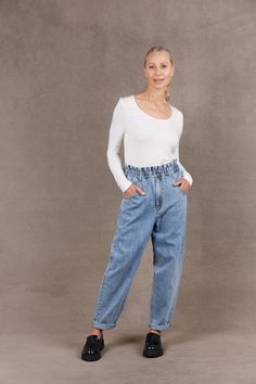 STYLE DETAILS: Introducing your new favourite jeans: the Meta Denim Pant, a definitive staple for your wardrobe. Boasting a high-rise paper bag waist, a relaxed fit, and ankle-length coverage, these jeans are designed for seamless mixing and matching, ensuring endless versatility and practicality for your everyday style. Wear them cuffed or uncuffed—your ideal companion for effortless looks. FEATURES: Mum Jeans High rise Paperbag waist Button closure Zipper fly Side and patch pockets Ankle-lengt