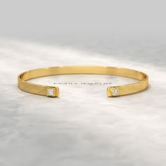 Indulge in timeless elegance with our exquisite Diamond Solitaire Cuff Bracelet. Crafted from radiant 10K, 14K, or 18K solid gold, this cuff exudes sophistication. Its shimmering lab-grown diamond, meticulously set in a prong setting, captivates with its brilliance. Wear it as a statement piece or a cherished keepsake, this custom cuff bangle bracelet is a testament to your impeccable taste. 𝐅𝐞𝐚𝐭𝐮𝐫𝐞𝐬: * 𝐌𝐚𝐝𝐞 𝐭𝐨 𝐎𝐫𝐝𝐞𝐫 * 𝐌𝐞𝐭𝐚𝐥: 𝟏𝟎𝐊 𝐆𝐨𝐥𝐝 | 𝟏𝟒𝐊 𝐆𝐨𝐥𝐝 | 𝟏𝟖𝐊 𝐆? Classic Gold Bangle With Single Diamond, Classic Bangle With Single Diamond For Anniversary, Gold Bangle With Single Diamond For Formal Events, Gold Bangle With Single Diamond For Formal Occasions, Elegant 14k Gold Bangle With Single Diamond, Classic Single Diamond Bangle For Anniversary, Timeless Single Diamond Bangle For Anniversary, Classic Anniversary Bangle With Single Diamond, Timeless Anniversary Bangle With Single Diamond