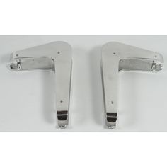 pair of stainless steel door handles on white background