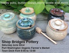 an advertisement for pottery on display in front of some plants and flowers with the text shop bridges pottery saturday june 2nd port washington organic farmer's market town