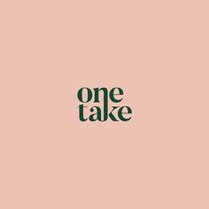 the word one take written in black on a pink background