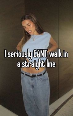 a woman standing in front of a wall with the caption i seriously can't walk in a straight line