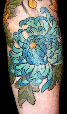 a blue flower with leaves on it's arm and the words, i love you