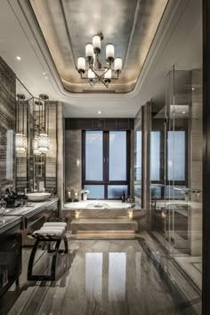 an elegant bathroom with marble floors and walls