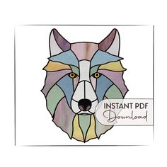 a stained glass wolf head with the words instant df on it's side