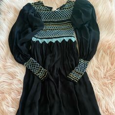 This Is A Beautiful One Of A Kind Staple In Your Closet Sized Xs Black Dress With Gray And Tan Embroidery. Fall Fashion Fitted Long Sleeve Embroidered Dress, Black Embroidered Dress With Geometric Patterns For Spring, Black Dress With Geometric Embroidery For Spring, Black Embroidered Dresses For Fall, Fall Long Sleeve Dresses With Geometric Embroidery, Bohemian Embroidered Fitted Dress With Long Sleeves, Fitted Dresses With Embroidered Sleeves For Fall, Fitted Fall Dresses With Embroidered Sleeves, Fitted Embroidered Dress With Geometric Embroidery And Long Sleeves