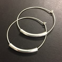 1 1/2 inch Sterling silver hoop earrings. Handcrafted. Simple, classic, timeless. Curved tubes (available in silver, shiny gold or antique gold) are threaded onto 1 1/2 inch diameter handcrafted sterling silver hoops. Earrings Features: * Extremely lightweight! * Measure 1 1/2 inch diameter * Minimalist, Dainty and Unique * Best Sellers, very popular design * Inspired by the one and only Joanna Gaines from Fixer Upper. These seem right up her alley! Plastic backs are provided with every pair and Small Hypoallergenic Metal Hoop Earrings, Adjustable Small Hoop Beaded Earrings, Adjustable Pierced Hoop Earrings, Adjustable Hoop Earrings With Ear Wire, Adjustable Small Hoop Earrings Nickel Free, Nickel-free Hoop Jewelry, Adjustable Nickel-free Hoop Earrings, Hypoallergenic Adjustable Hoop Earrings, Silver Hoop Earrings Medium