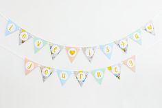 a bunting banner with the words love you spelled on it