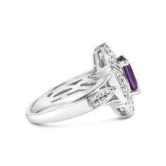 Envelop your finger in the splendor of the Art Deco era with this sterling silver cocktail ring, where vintage charm meets contemporary allure. Central to its grandeur is a 9x7 mm oval amethyst, its vibrant purple hue a testament to both nature's artistry and human ingenuity. The stone's vivacity is further illuminated by the illusion of shimmering diamonds, artfully created by meticulous metal beading that catches the light, mimicking the scintillation of additional gems. These beads not only e Timeless Polished Amethyst Ring For Formal Occasions, Classic Purple Jewelry With Polished Finish, Elegant Purple Ring With Polished Finish, Elegant Purple Rings With Polished Finish, Classic Amethyst Ring For Collectors, Classic Collectible Amethyst Rings, Elegant Oval Amethyst Ring With Diamond Accents, Timeless Oval Amethyst Ring For Anniversary, Elegant Purple Platinum Rings