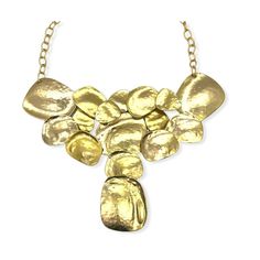 Vintage brutalist style bib necklace by designer Kenneth J Lane. Statement necklace features large interconnecting flat discs of hammered gold plated metal. It has a plated open link chain with large hook closure. The necklace is deadstock and had its original hangtag and price of $150. Unworn condition. Note that the necklace was hand crafted and does show slight variation in color, bubbles and marks in the plating. This is consistent with the piece and should not be considered flaws. Please se Modern Hammered Metal Necklace, Gold-tone Hammered Metal Necklace, Gold Metal Bib Necklace, Hammered Gold Metal Necklaces, Gold Metal Bib Necklace With Adjustable Chain, Gold Hammered Metal Necklaces, Gold Hammered Metal Necklace, Bolero Dress, Peignoir Sets