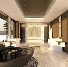 a large bathroom with marble floors and walls