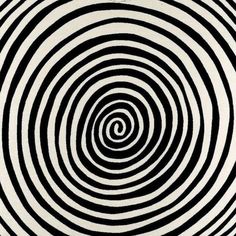 an abstract black and white pattern with spirals in the center, as if it was made out of paper