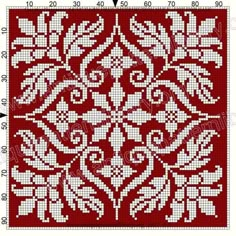 a cross stitch pattern with leaves and flowers on it, which is in the shape of a