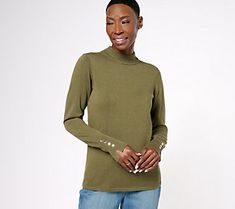 Bump up your basics with this mock-neck sweater. This lightweight layer can be worn alone or teamed with a biker jacket for an ultra-chic, ultra-sleek style. And there's no need to wear a bracelet with this top, the snaps at the cuff add visual allure to the look. From the Joan Rivers Classics Collection®.