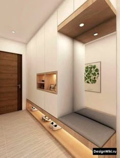 a room with white walls and wooden shelves