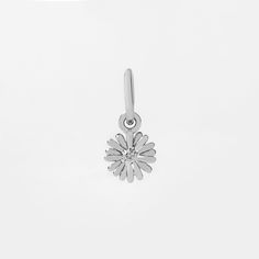 Celebrate April birthdays with this beautiful birth flower – April Daisy Birth Flower Pendant! Add this special, little flower pendant to your favorite dainty chain for a meaningful gift for the Aries or Taurus in your life. Delicate Flower Pendant Charm Necklace, Nickel Free, Delicate Nickel-free Flower Pendant Charm Necklace, Nickel Free Flower Pendant Charm Necklaces For Everyday, Nickel-free Flower Pendant Charm Necklaces For Everyday, Everyday Flower Pendant Necklace, Everyday Flower Charm Necklace, Minimalist Flower Necklace With Flower Charm, Everyday Delicate Flower Charm Necklace, Dainty Sterling Silver Flower Charm Necklace