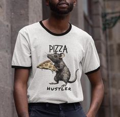 Pizza Hustler Ringer Shirt, Pizza Rat Lover Unisex Cotton Ringer T-Shirt 100% ring-spun cotton, with a contrasting 1x1 baby rib binding on the collar and sleeves to give it that classic style.  .: 100% combed, ring-spun cotton .: Light fabric (4.3 oz/yd² (146 g/m .: Classic fit Ringer Shirt, Rats, San Jose, Light Fabric, G M, Spun Cotton, Classic Style, Pizza, Bathing Beauties