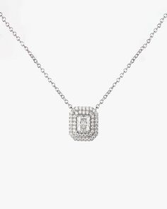 - Princess cut gemstone with Surrounding round cut stones Necklace- Made in Sterling silver set with a high-quality Cubic Zirconia. - Stone size: Princess cut 5.00 x 7.00 mm, Round cut 1.10 mm- Size : 12 x 14 mm ( 0.47 x 0.55 inch )- Chain length : 16 inch Sterling silver925 Sterling Silver is an alloy made of 92.5% pure silver and 7.5% copper. We plate our silver jewelry in rhodium, which gives it extra shine and durability. Rhodium is one of the costliest precious metals due to its rarity.Care Elegant Silver Solitaire Necklace With Single Cut Diamonds, Exquisite Silver Diamond Cut Diamond Necklace, Exquisite Silver Diamond Cut Necklace, Exquisite Silver Diamond Necklace With Diamond Cut, Silver Diamond-cut Necklace, Timeless Silver Jewelry With Single Cut Diamonds, Timeless Silver Necklace With Single Cut Diamonds, Elegant Silver Solitaire Necklace With Lab-grown Diamond, Elegant Silver Solitaire Necklace With Lab Grown Diamond