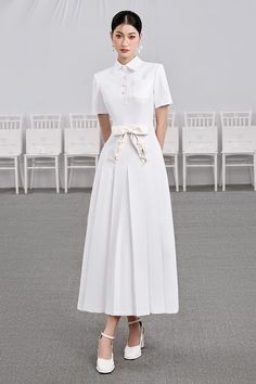 Luxury White A-line Dress, Classic White A-line Shirt Dress, Luxury Collared Dress For Formal Occasions, Luxury Short Sleeve Midi Dress For Work, Luxury Collared Formal Dress, Elegant Spring Shirt Dress With Collared Neckline, Feminine Collared Neckline Dress For Workwear, Feminine Collared Dress For Work, Elegant Fitted Dress With Collared Neckline