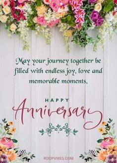 an anniversary card with flowers on it