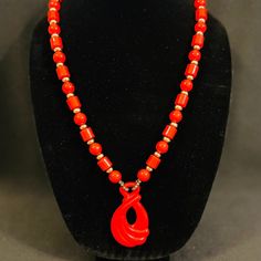 Red Lucite Beaded Necklace w/ Abstract Teardrop Pendant, unsigned beauty; Vintage, from an estate lot of 1970's pieces; Spring ring clasp; Silver tone separator beads, red lucite spherical and cylindrical beads, abstract teardrop shaped red lucite pendant; Dimensions: necklace length 24 inches, pendant height 2.75 inches, pendant width 1.5 inches; Weight: 54.3 grams; Excellent vintage condition; See photos for additional details; Please be conscious that vintage items have lived an earlier life Vintage Style Dangling Beads For Gift, Mid-century Red Jewelry For Gift, Vintage Red Necklace With Colorful Beads, Handmade Retro Red Beaded Necklaces, Handmade Red Retro Beaded Necklaces, Handmade Red Beaded Retro Necklace, Vintage Red Necklaces With Colorful Beads, Vintage Red Beaded Jewelry, Red Vintage Necklace For Collectors