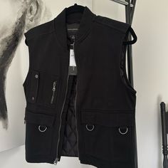 100% Cotton Zip Up Vest With Pockets Black Utility Vest For Winter, Black Cotton Biker Outerwear, Black Cotton Utility Vest, Military Style Cotton Vest Outerwear, Military Style Sleeveless Cotton Vest, Khaki Military Vest With Side Pockets, Zip Up Vest, Vest With Pockets, Men’s Zippered Vest